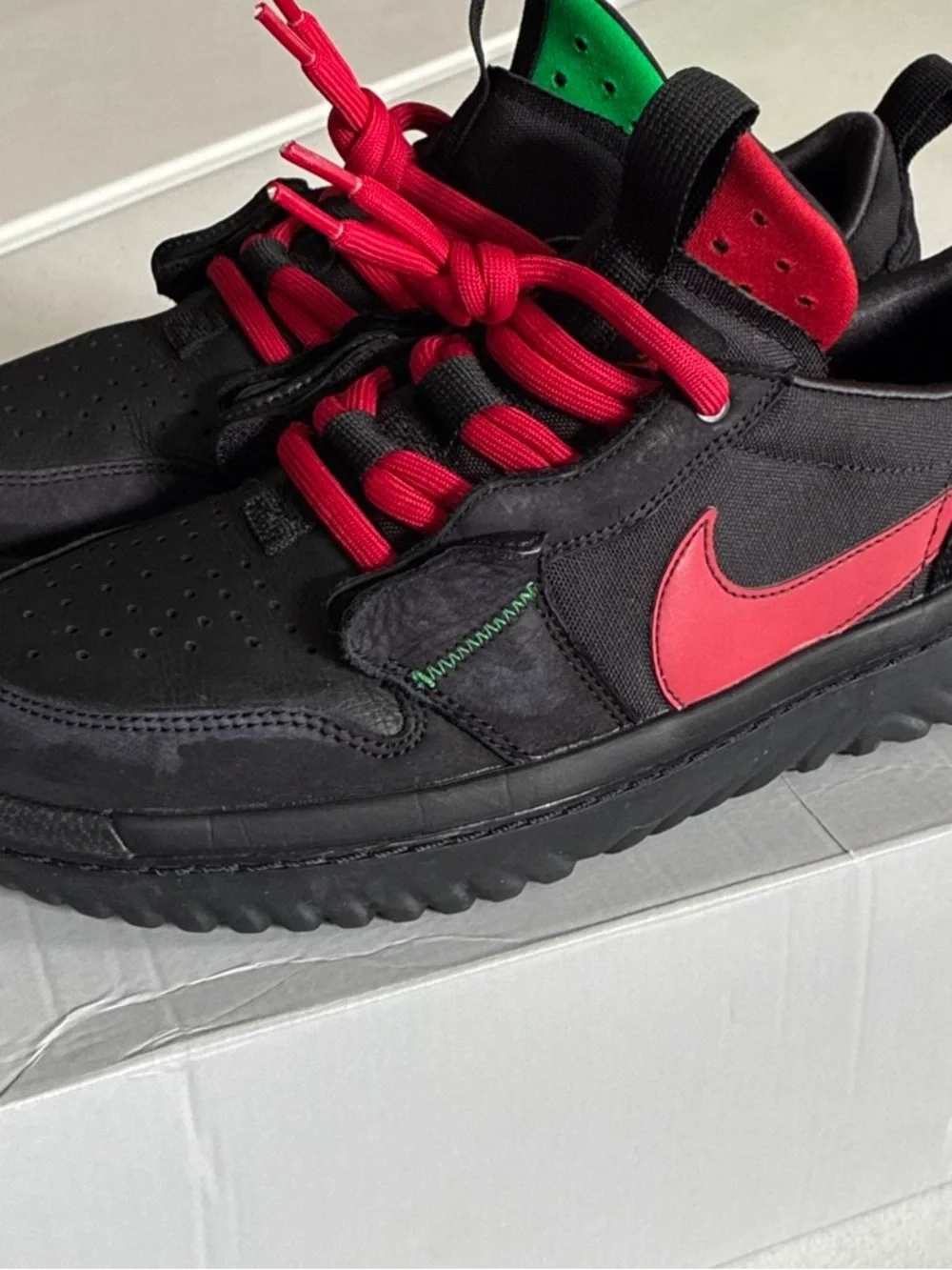 Nike Men’s Black Sneakers with Red Swoosh and Red Laces